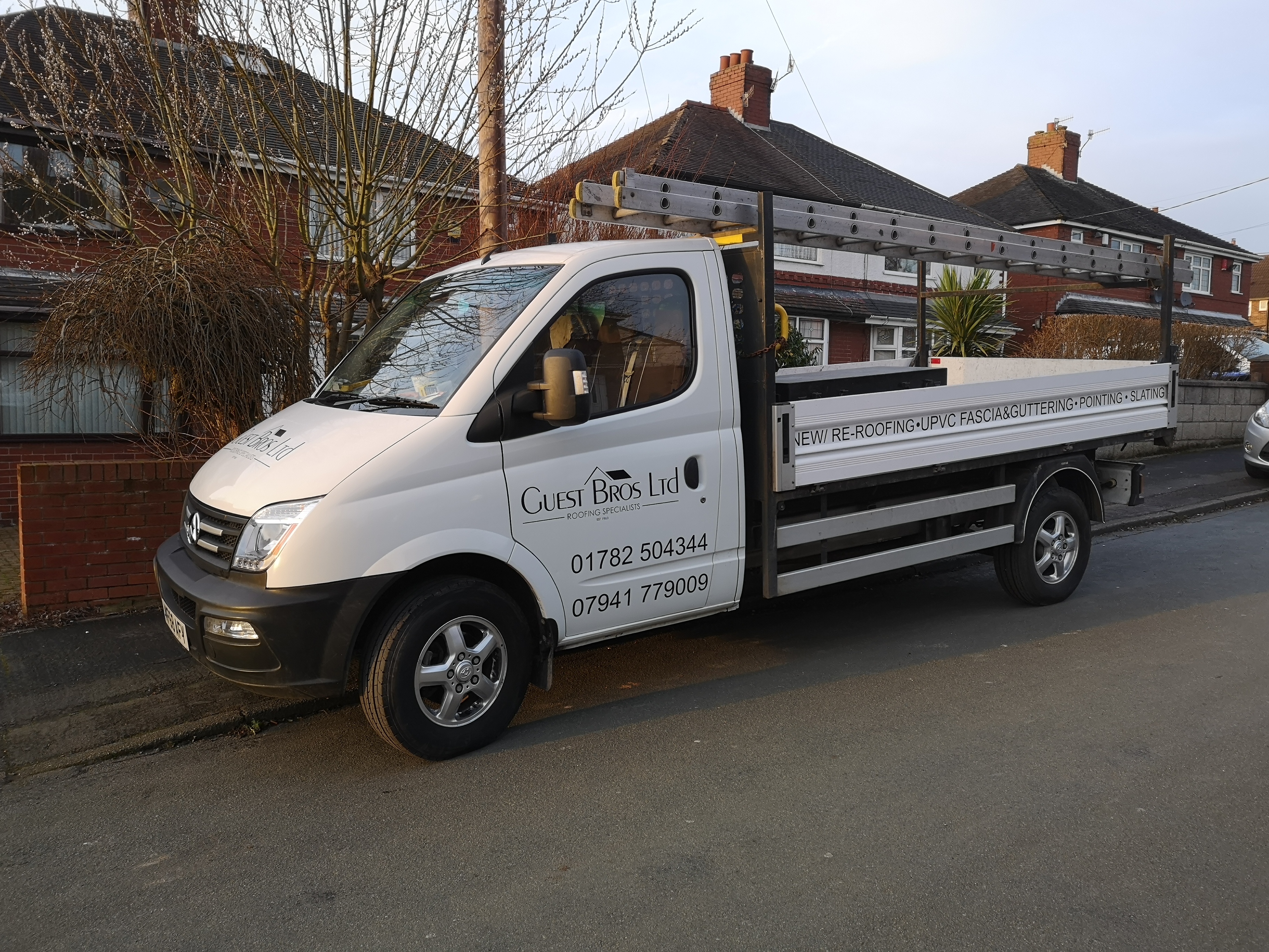 Guest Brothers roofing van